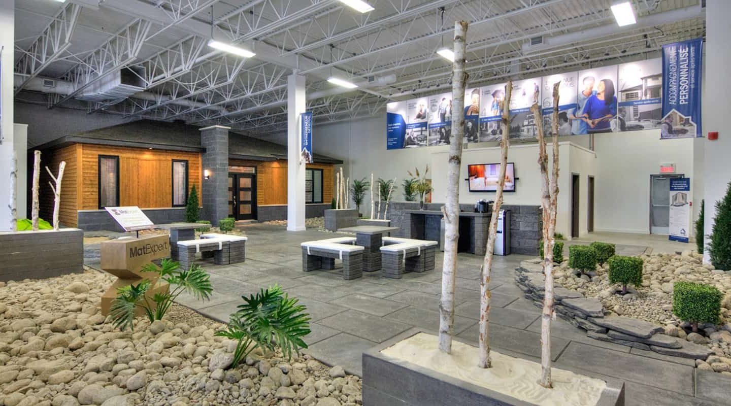 Interior view of the Beloeil showroom. Moka model prefabricated house in background.