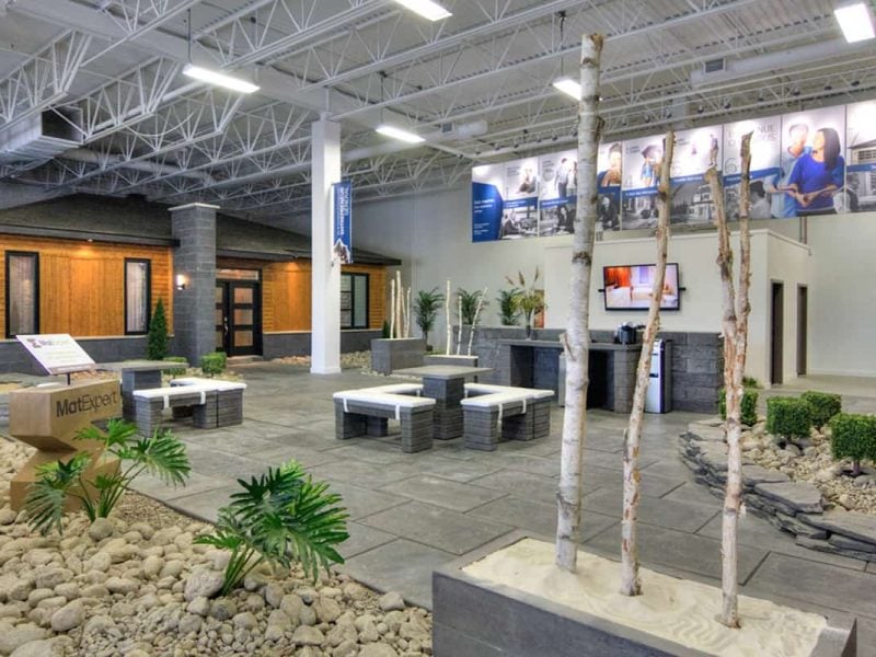 Interior view of the Beloeil showroom. Moka model prefabricated house in background.