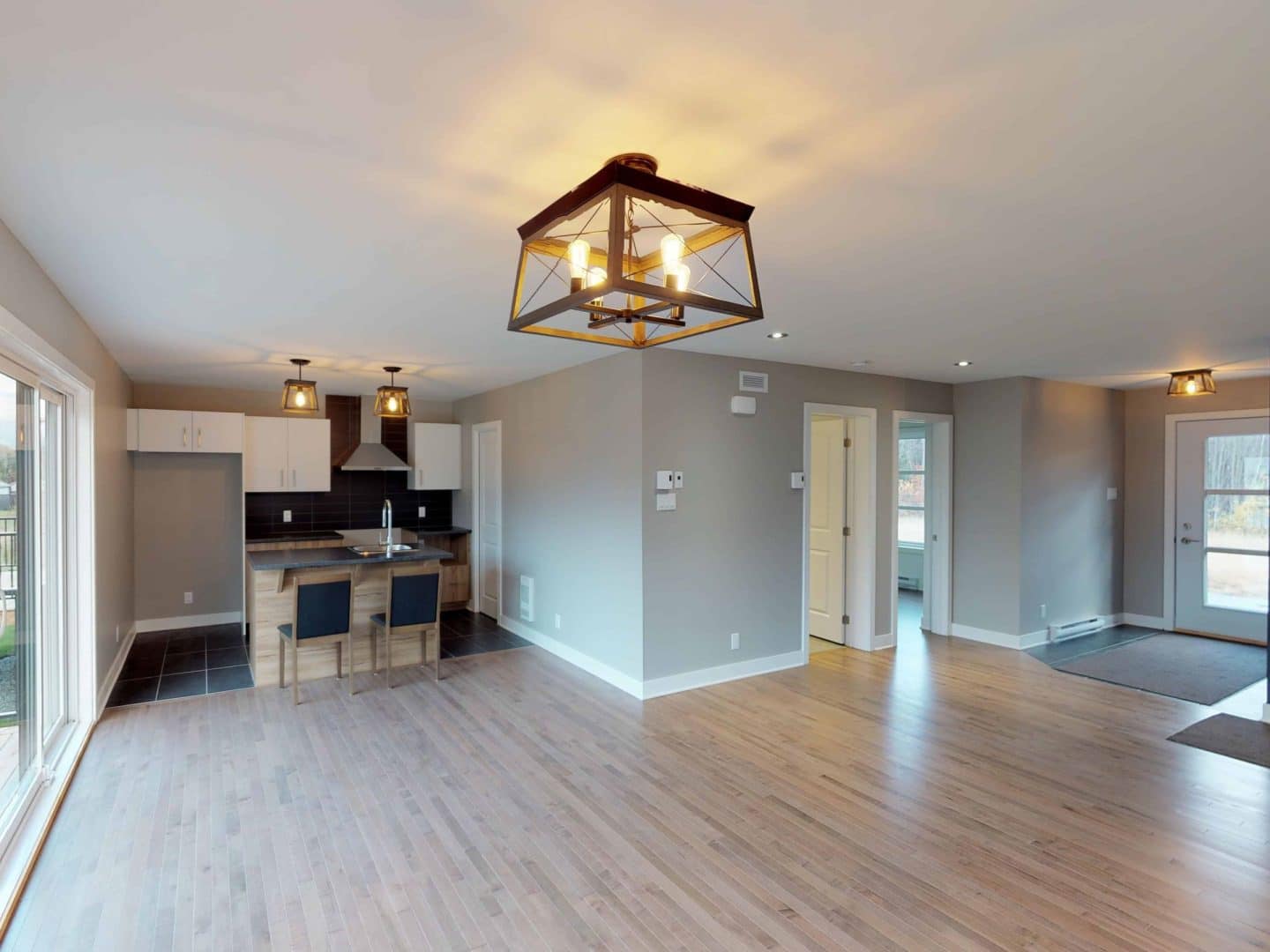 Semi-detached / bi-generation one-storey prefabricated house of the Magistral model in contemporary style. Interior dining room view.