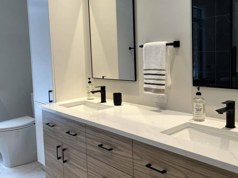 A ProFab home realization of a prestigious custom-built contemporary farmhouse style bungalow. View from the bathroom.