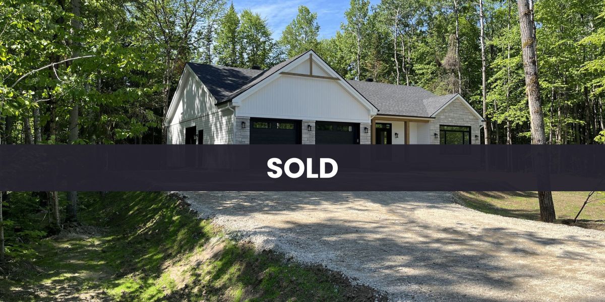 A custom-built ProFab home in a prestigious contemporary farmhouse style. Viewed from outside and marked SOLD