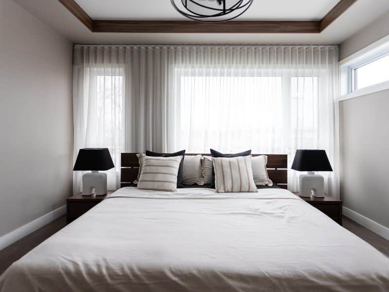 Magnifika two-storey prefabricated house in contemporary style. View of the master bedroom.