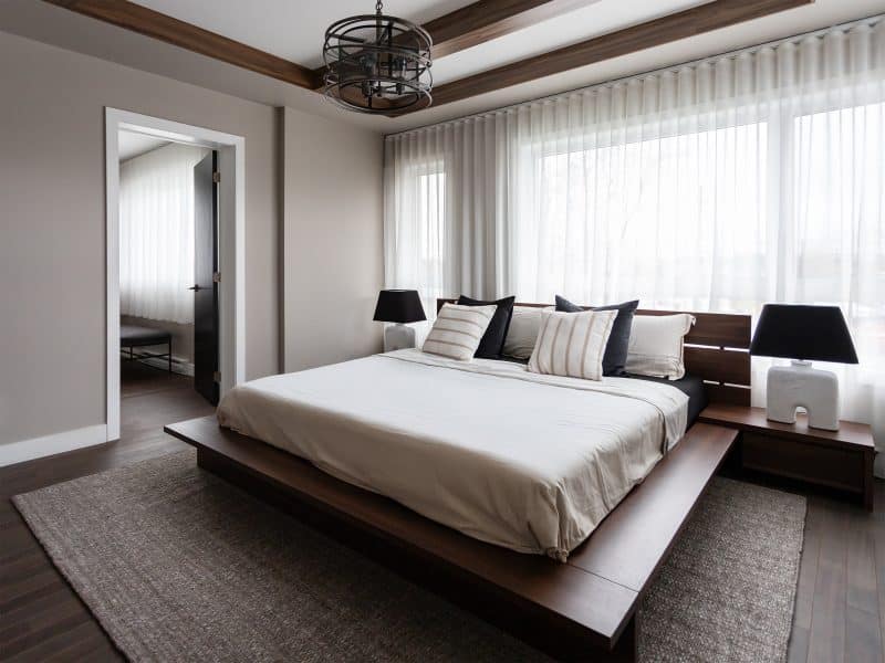 Magnifika two-storey prefabricated house in contemporary style. View of the master bedroom.
