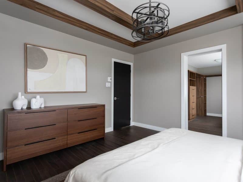 Magnifika two-storey prefabricated house in contemporary style. View of the master bedroom.
