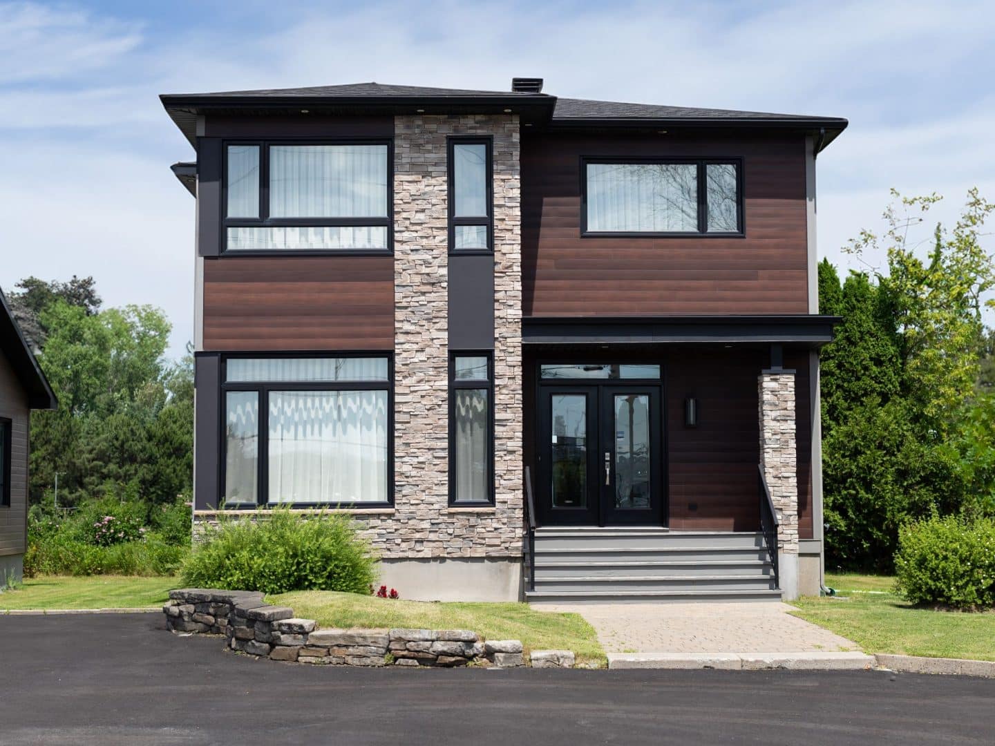 Magnifika two-storey prefabricated house in contemporary style. Exterior view.