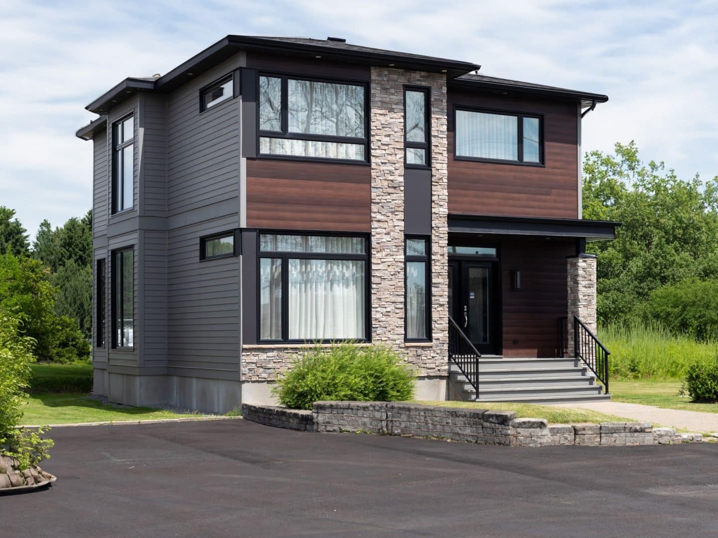 Magnifika two-storey prefabricated house in contemporary style. Exterior view.