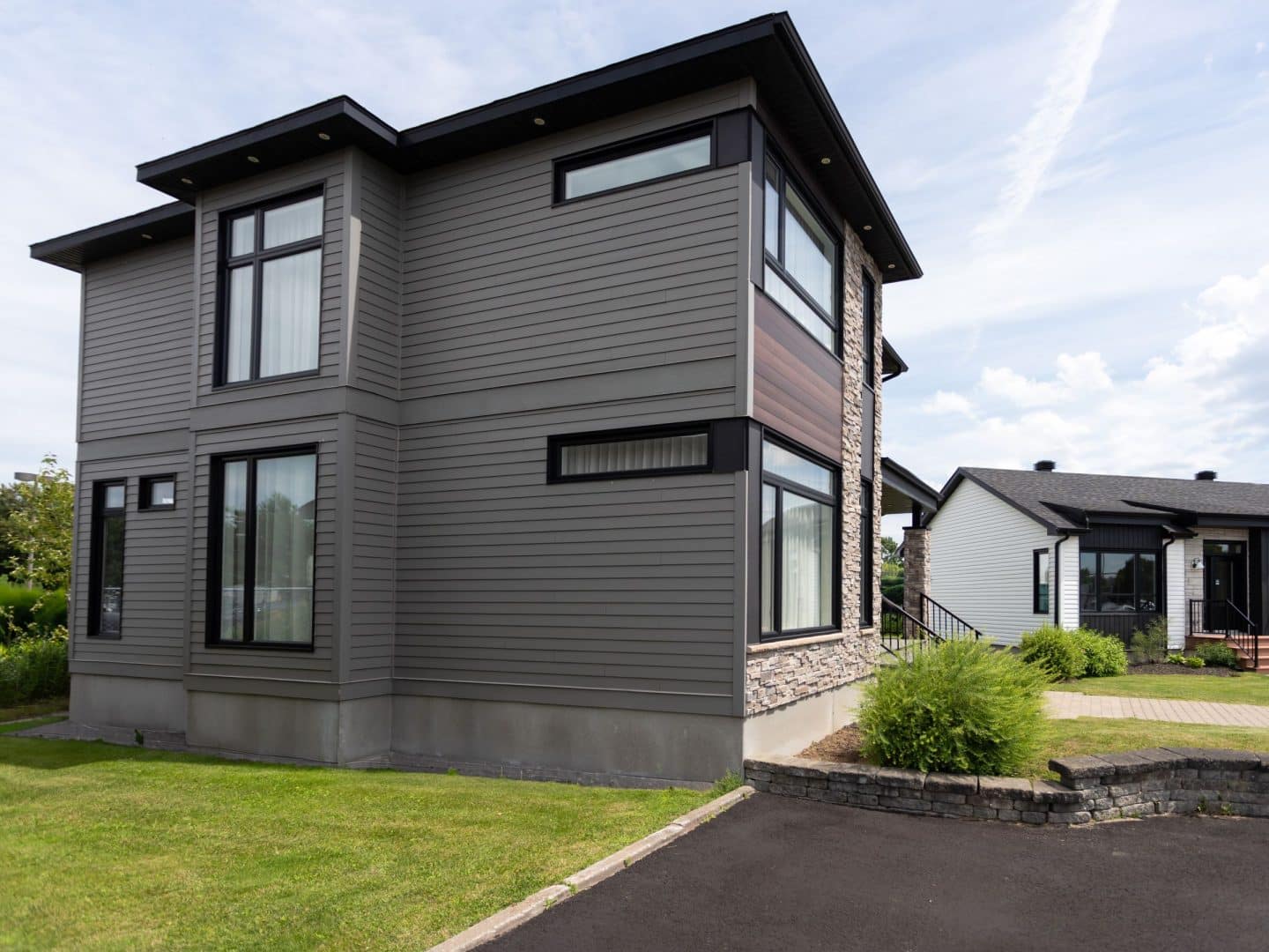 Magnifika two-storey prefabricated house in contemporary style. Exterior view.
