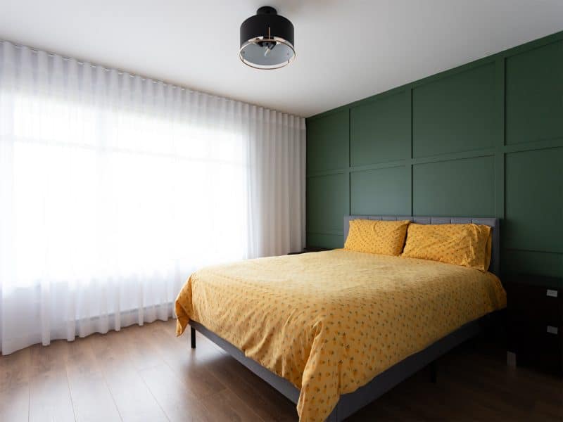 A realization of a house called Vanliga. The second floor is contemporary in style, as seen from the master bedroom.