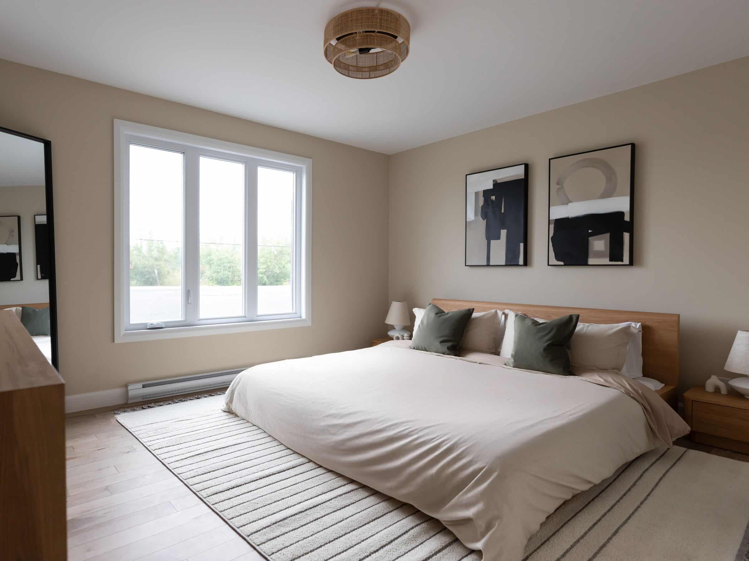 Maison modèle Turquoise vous accueille à Saint-Germain-de-Grantham. Une réalisation ProFab avec une vu de la chambre des maitres.