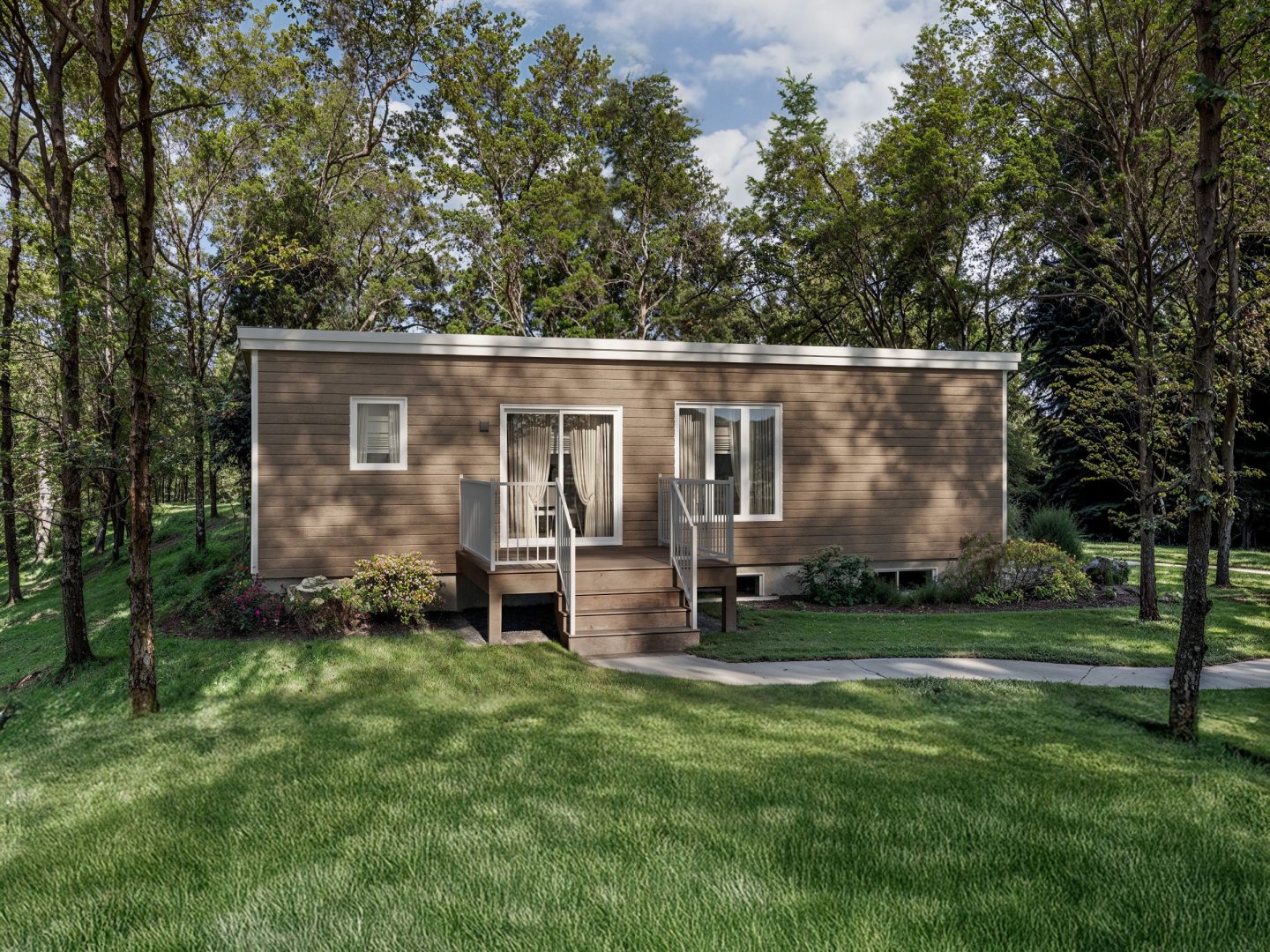Le modèle Filao est un plain-pied micro habitation de style contemporain. Vue de l'extérieur arrière.
